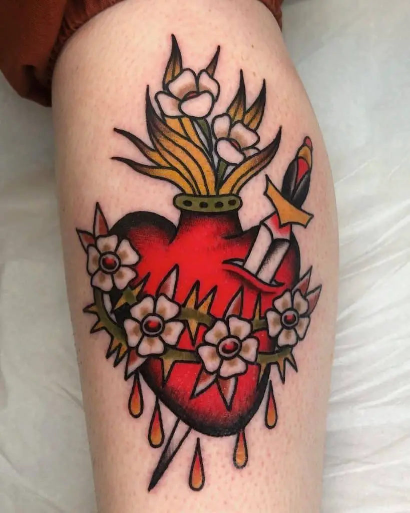 Dramatic And Colorful Heart Tattoo With Splash Of Color