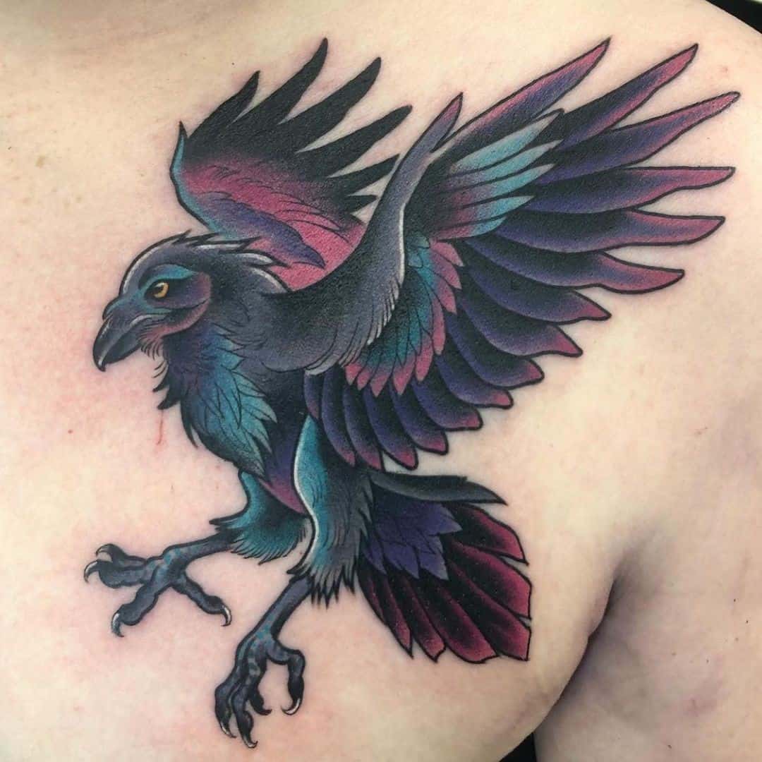 Colorful Raven Tattoo Over Chest 