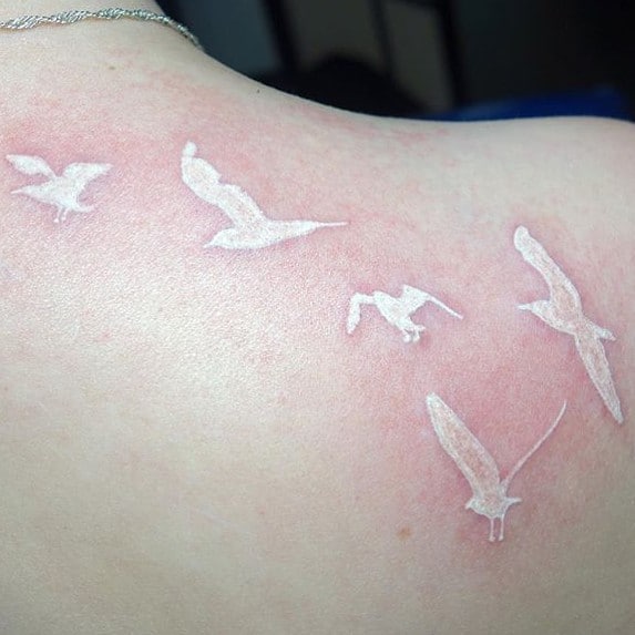 White Ink Tattoos On Dark Skin, saved tattoo, Birds 2
