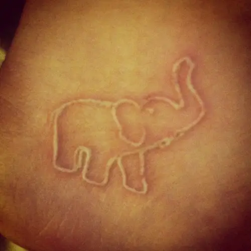 White Ink Tattoos On Dark Skin, saved tattoo, Elephant 3