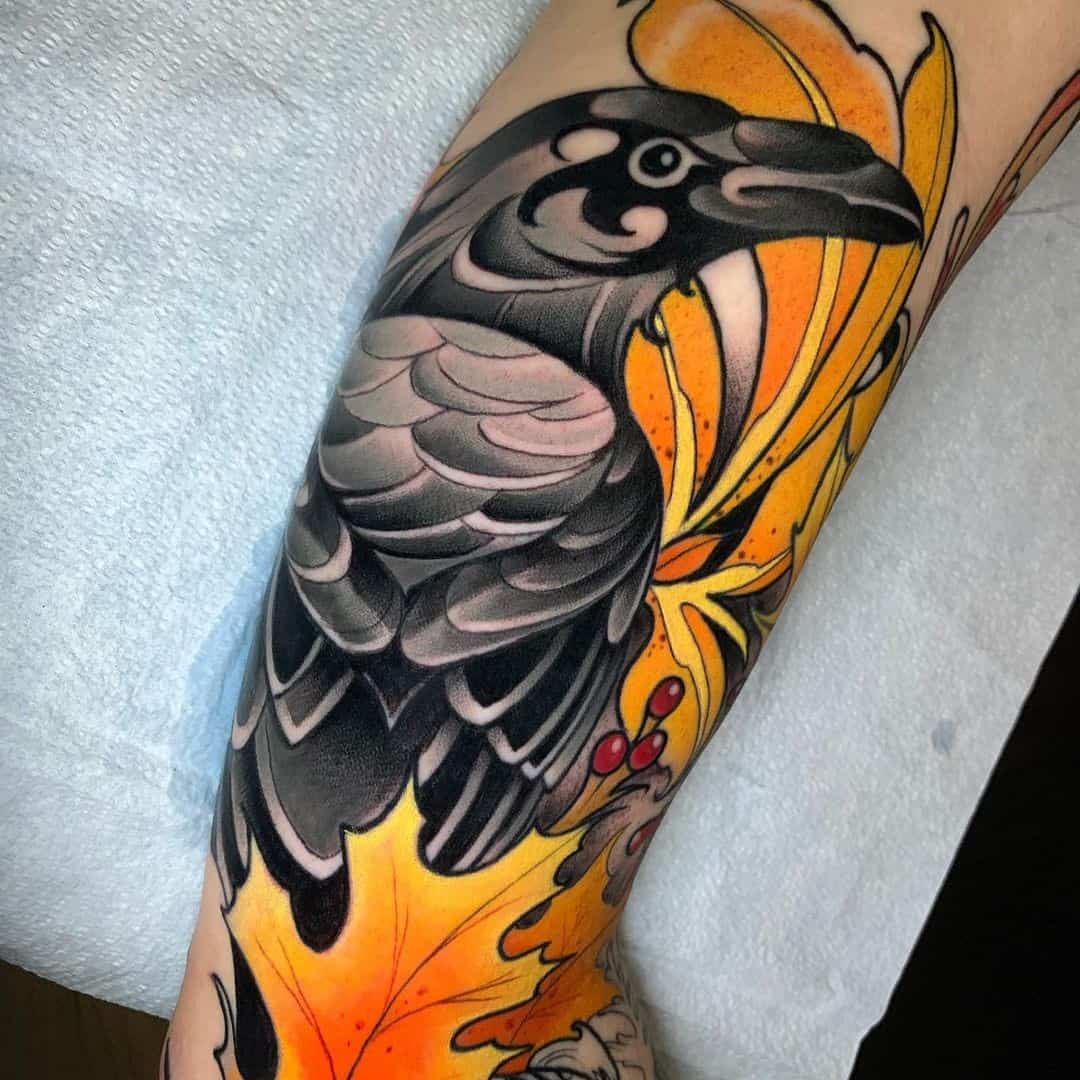 Yellow And Black Ink Raven Tattoo