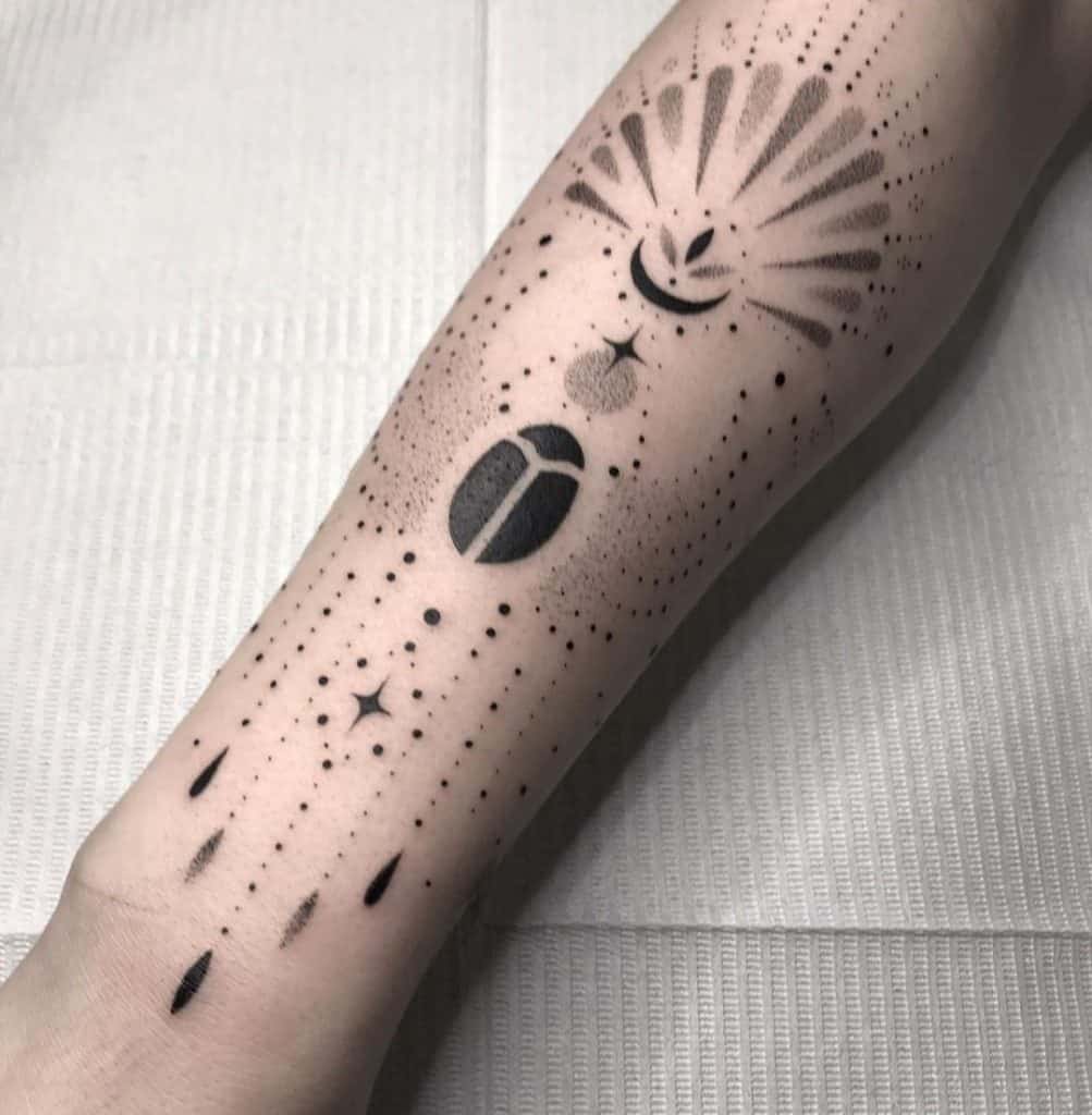 Intricate Sun and Moon Solar System Tattoo Design 5