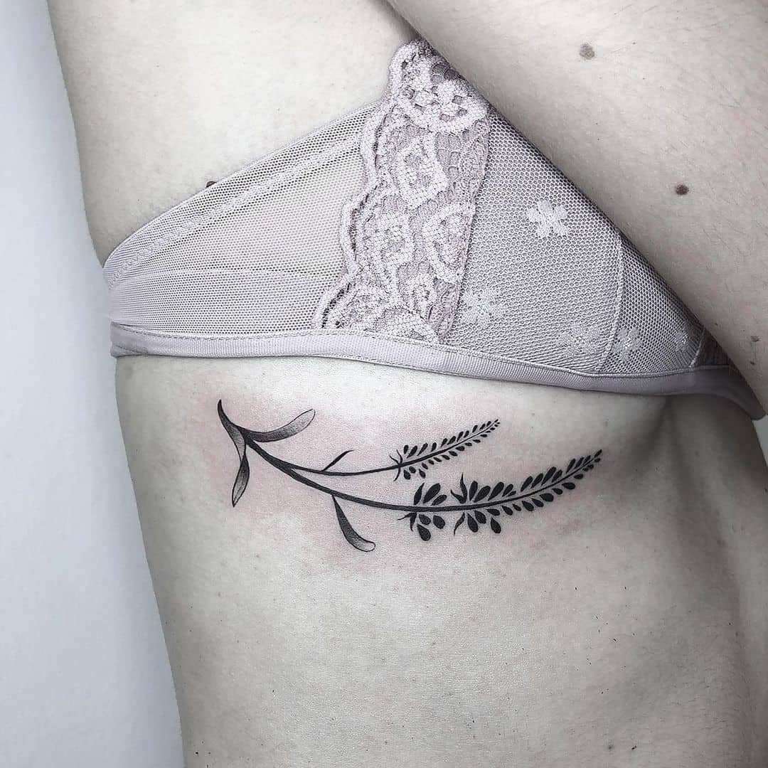 Black Lavender tattoo on chest 