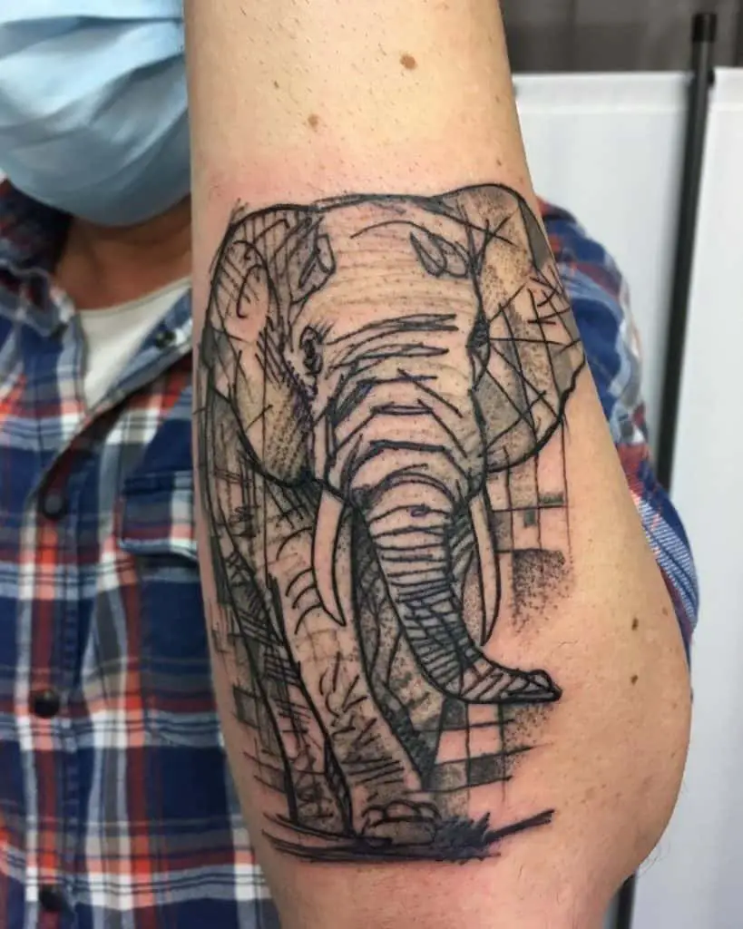 Black and Gray Elephant Tattoo on the arm