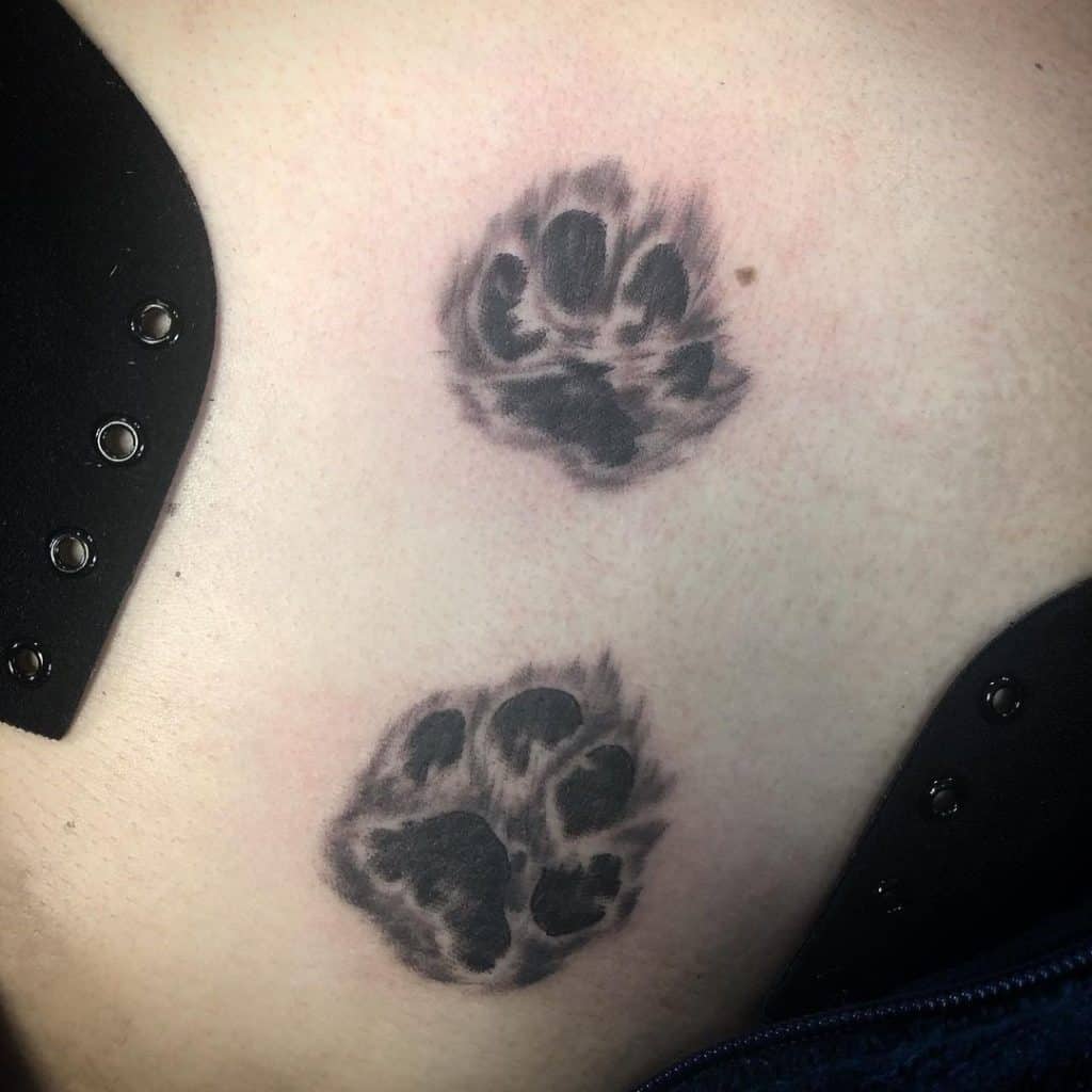 Dog Print Paw Tattoo on the chest