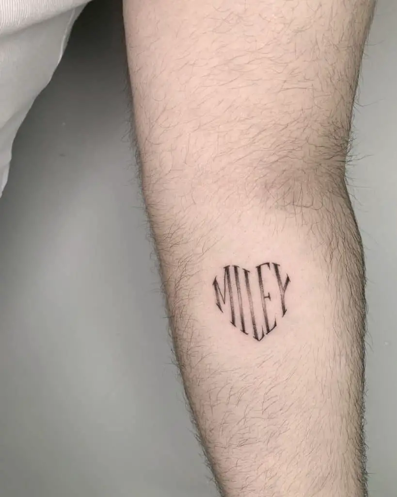 Heart-Shaped Name Tattoo
