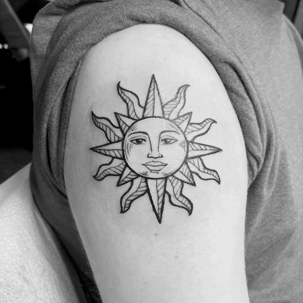 Sun Face Tattoo 4