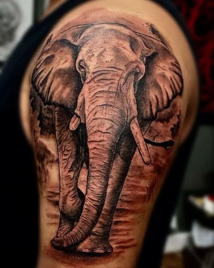 Walking elephant tattoo