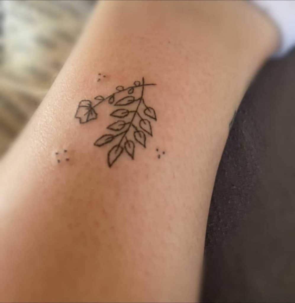 Floral Hand-Poked Tattoo Ideas 1