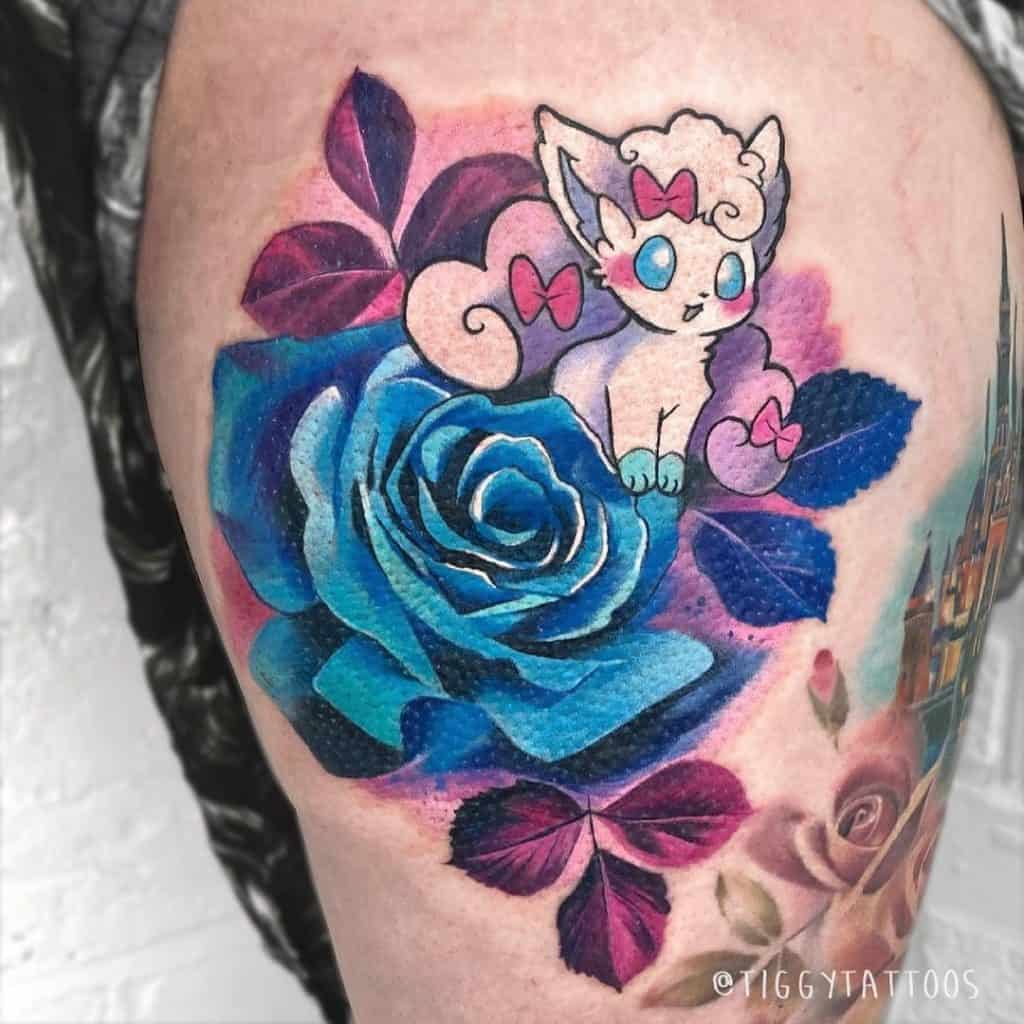 Pokemon and Blue Flower Tattoo