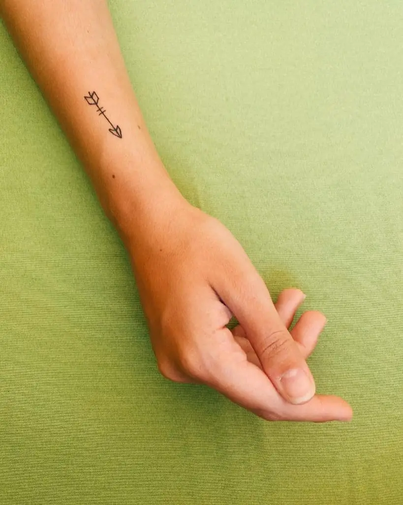 Arrow tattoo with big meanings 5