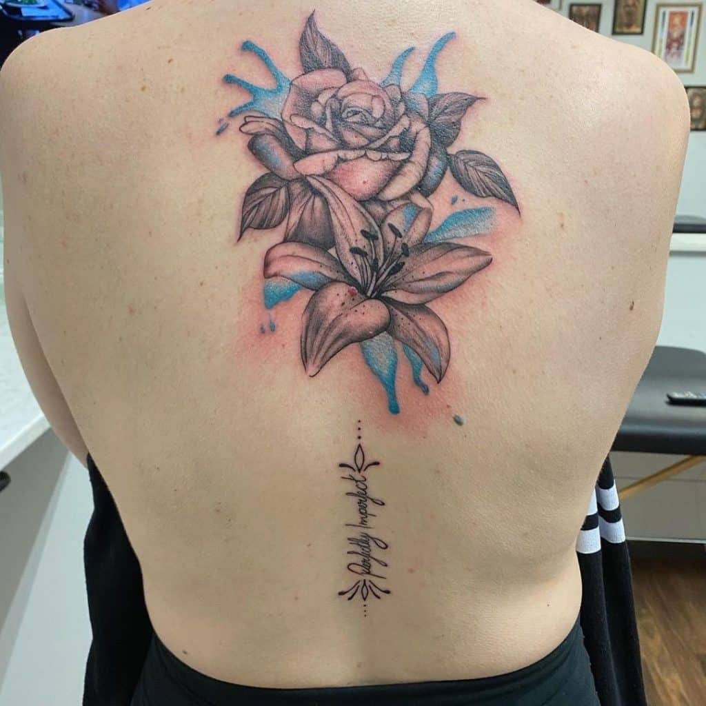 Bright & Colorful Lily And Rose Tattoo Back Design 