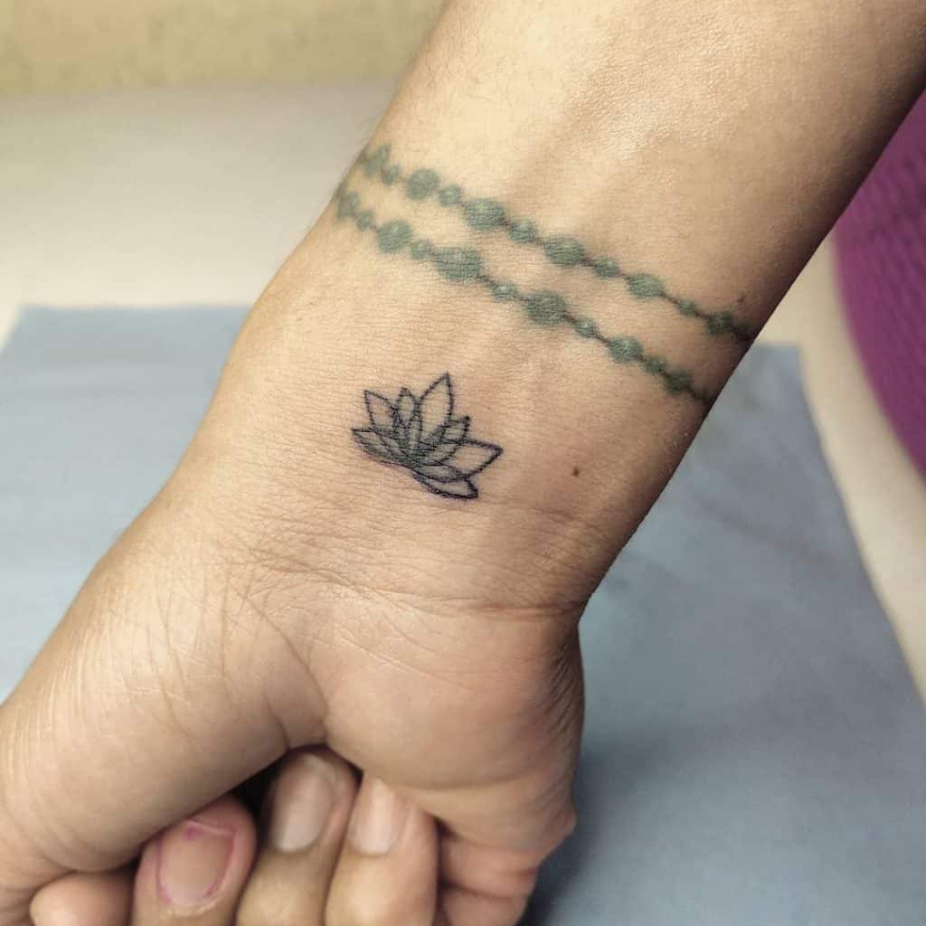 Lotus flower tattoo with big meanings 4