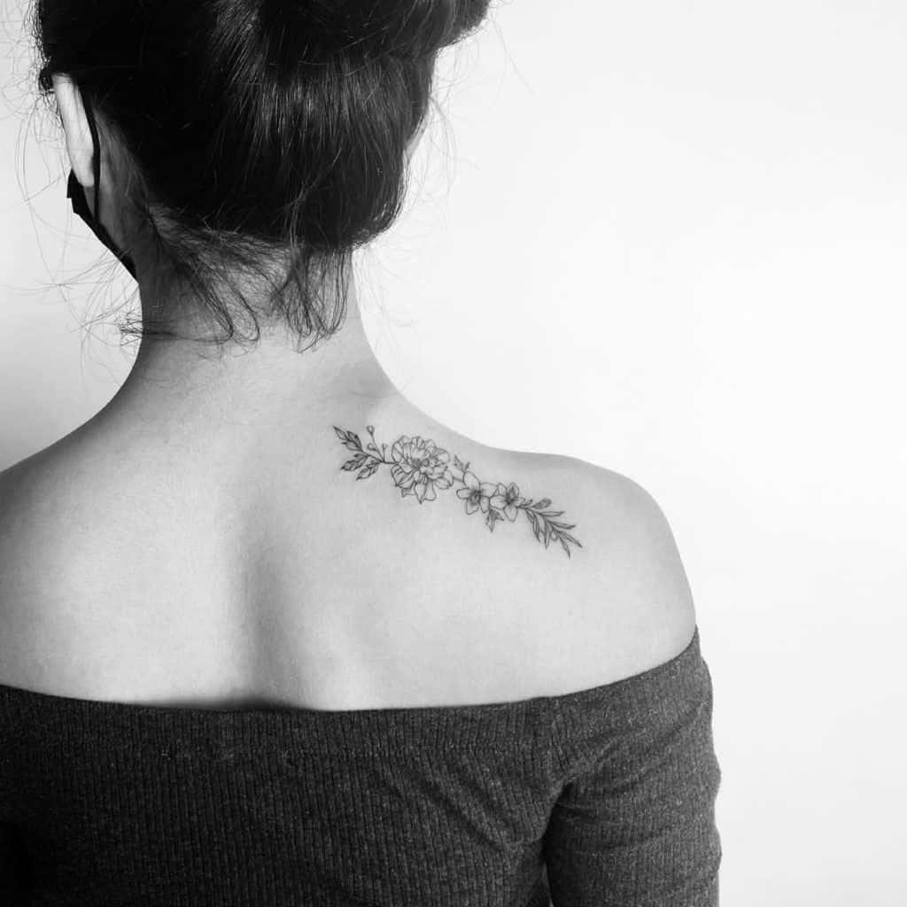 Olive Branch Tattoo With Floral Elements 2