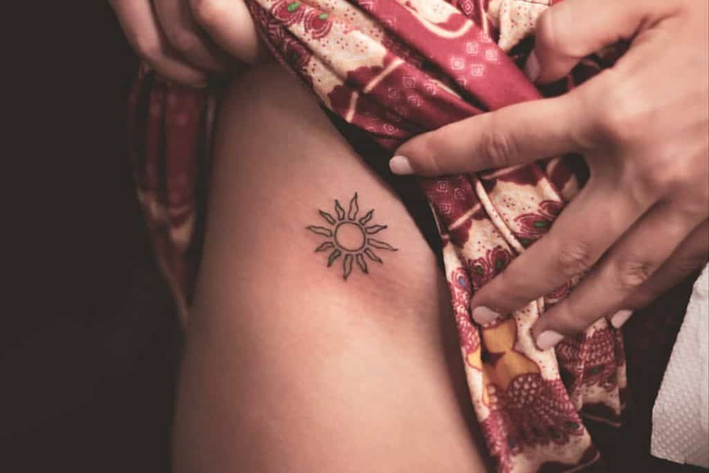 Sun tattoo with big meanings 4