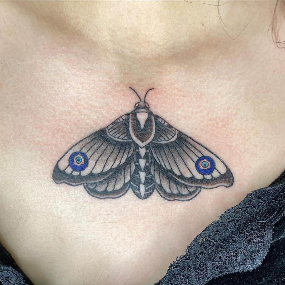 Butterfly Evil Eye Tattoo Over Chest 