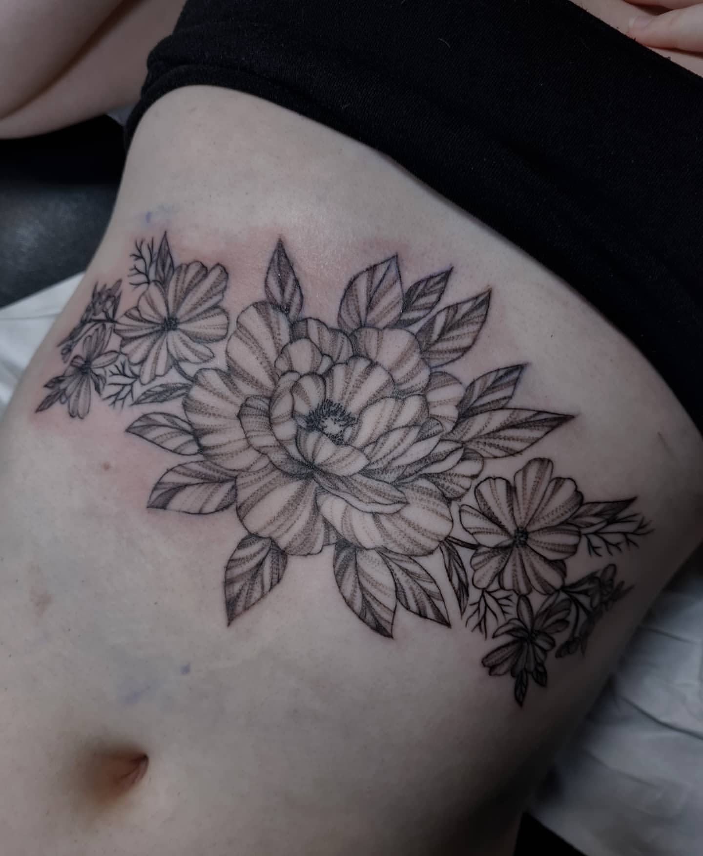 Floral Sternum Tattoo Idea