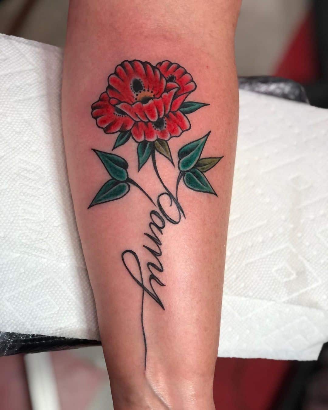 Red Poppy Flower Tattoo With Name Tag