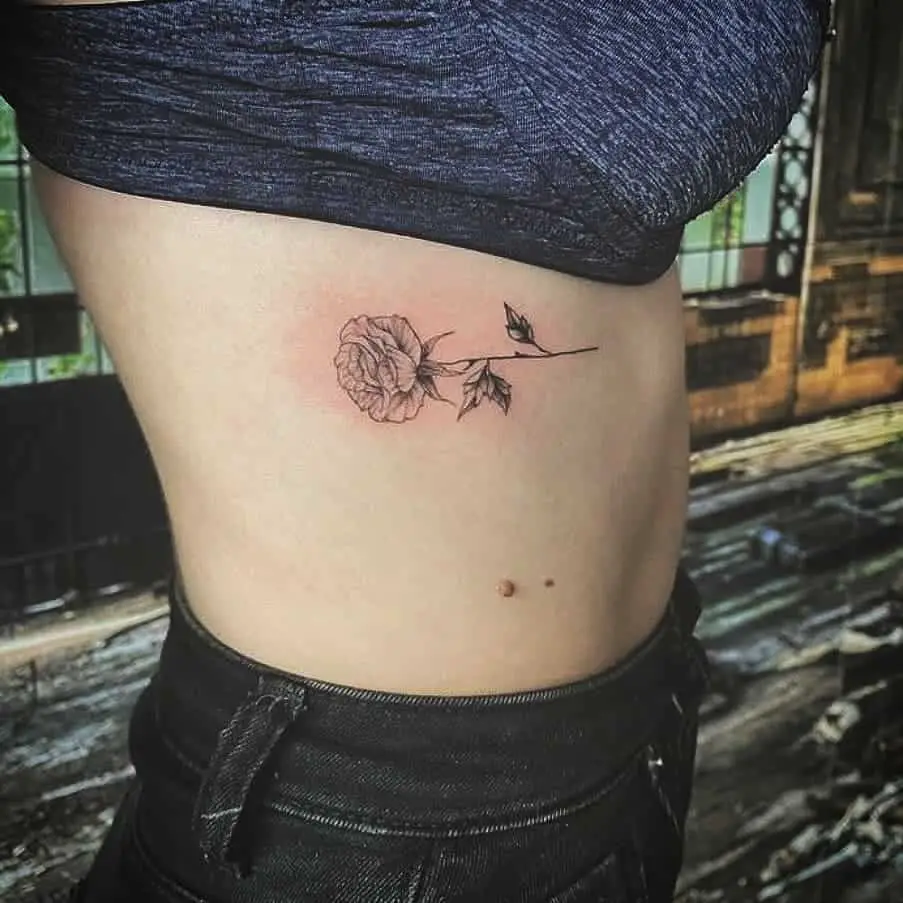 Rose side tattoo 1