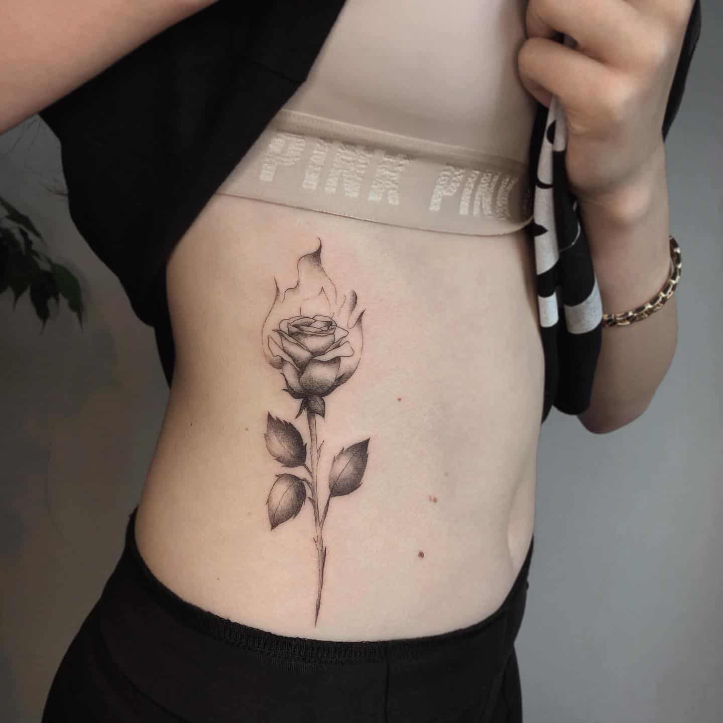 Rose side tattoo 3
