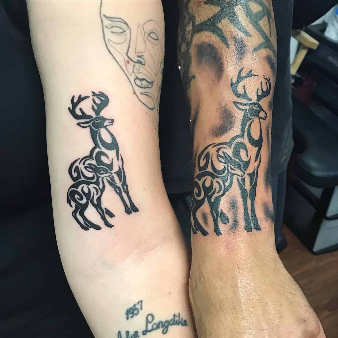 Tribal Father and Daughter Tattoos 1