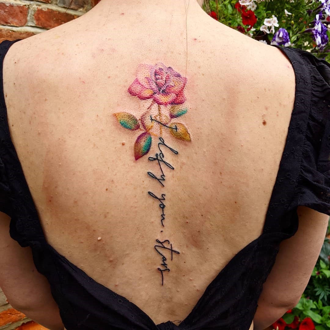 Bright Colorful Flower Spine Tattoo 