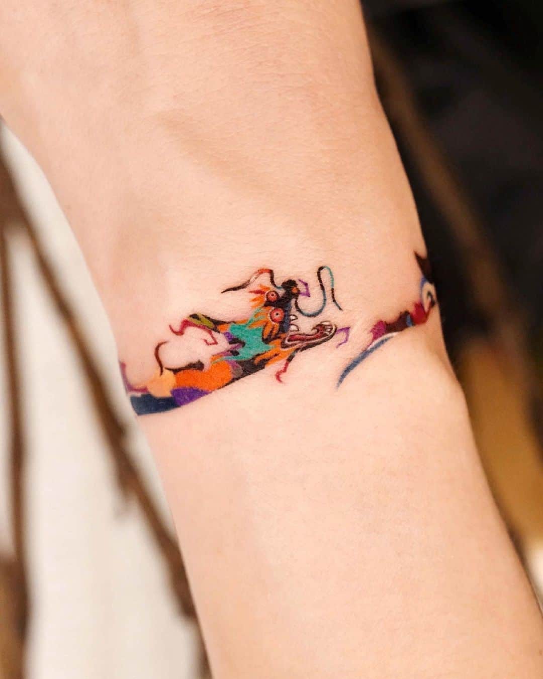 Dragon Inspired Bracelet Tattoo 