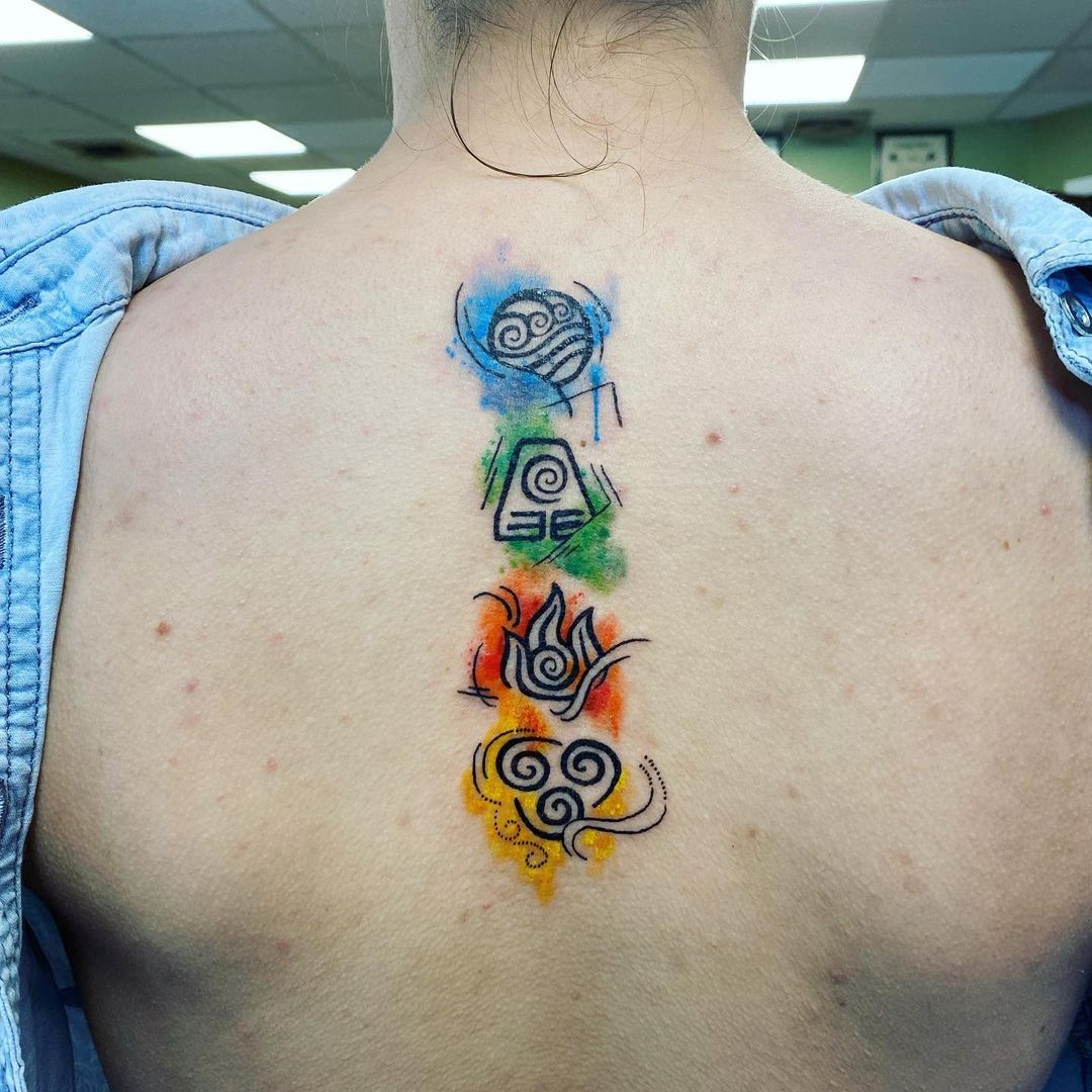 Earth Elements Inspired Spine Tattoo 