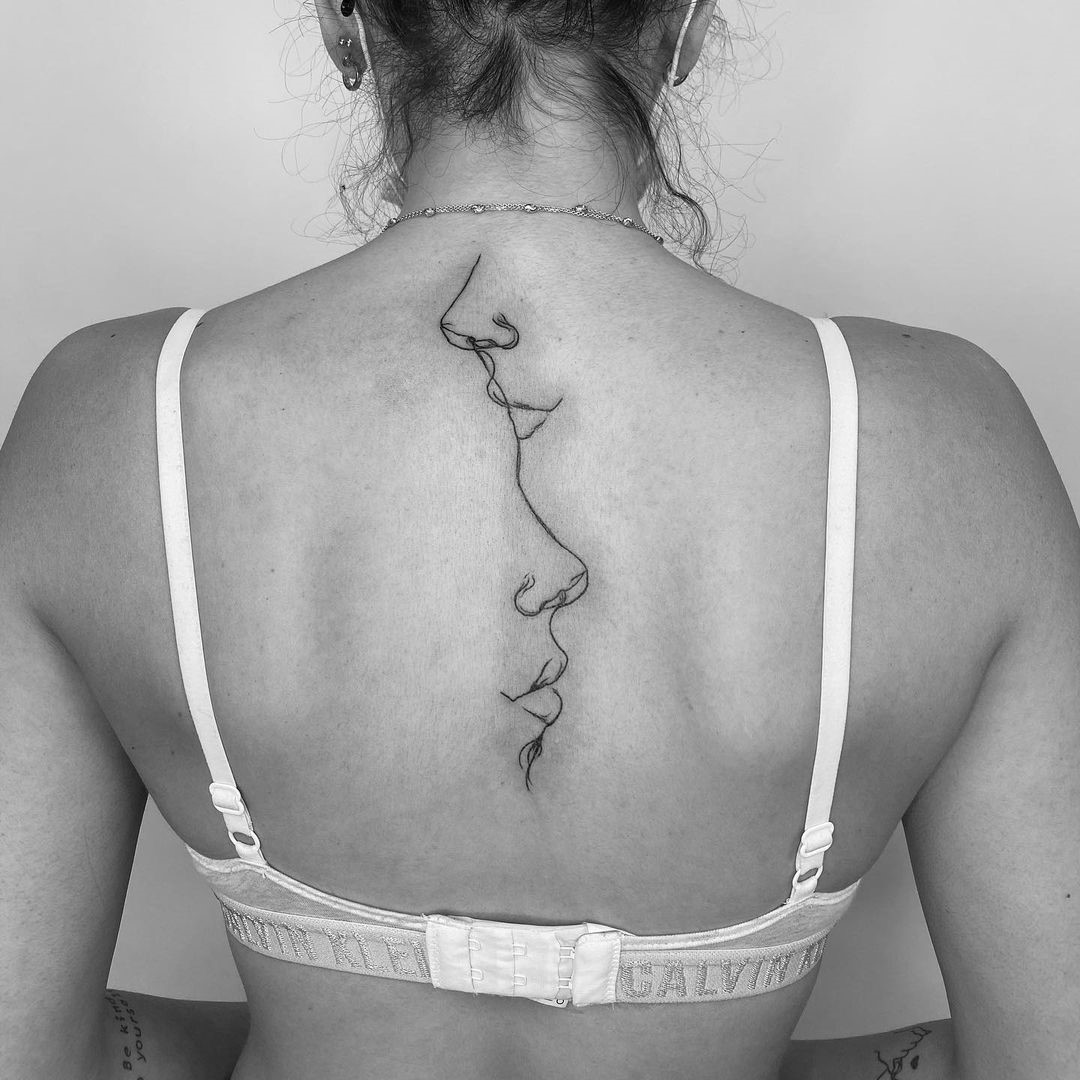 Feminine & Artsy Spine Tattoo 