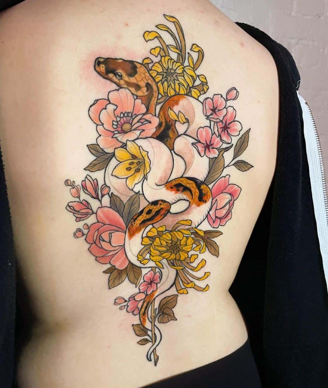 Giant Spine Tattoo Floral Idea 