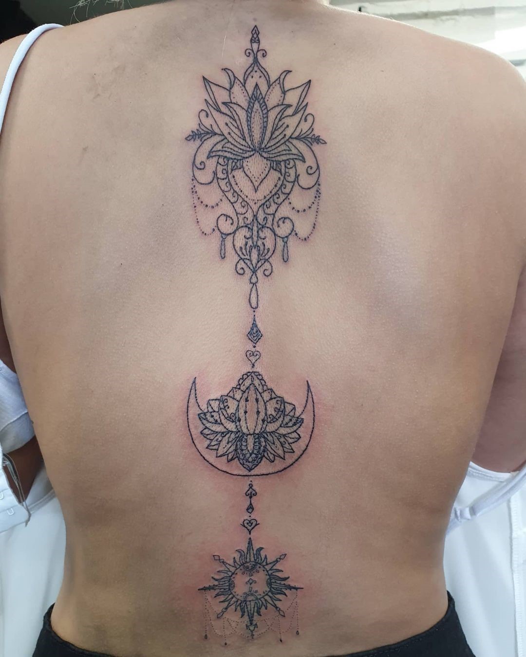 Lotus Flower & Mandala Spine Tattoo 
