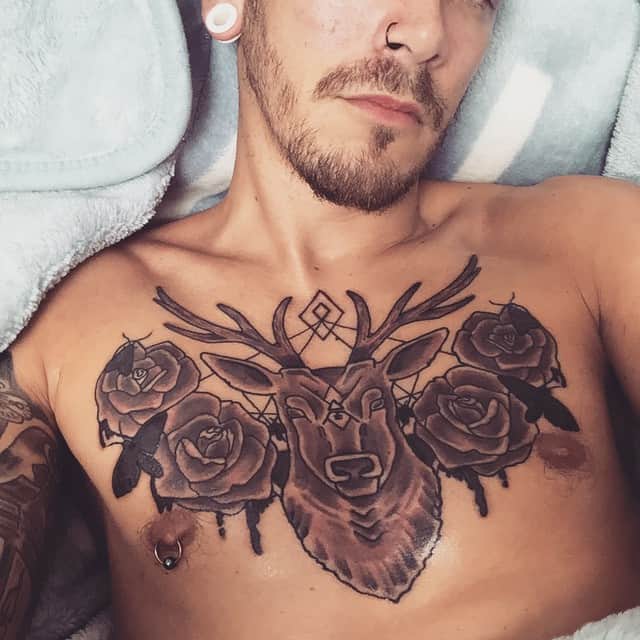 Rose chest tattoo 1