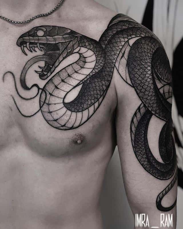 Snake chest tattoo 4
