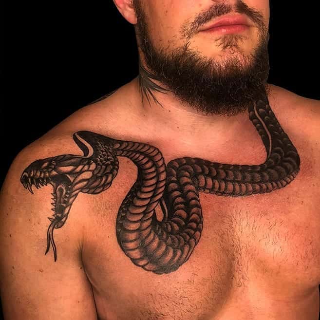 Snake chest tattoo 5
