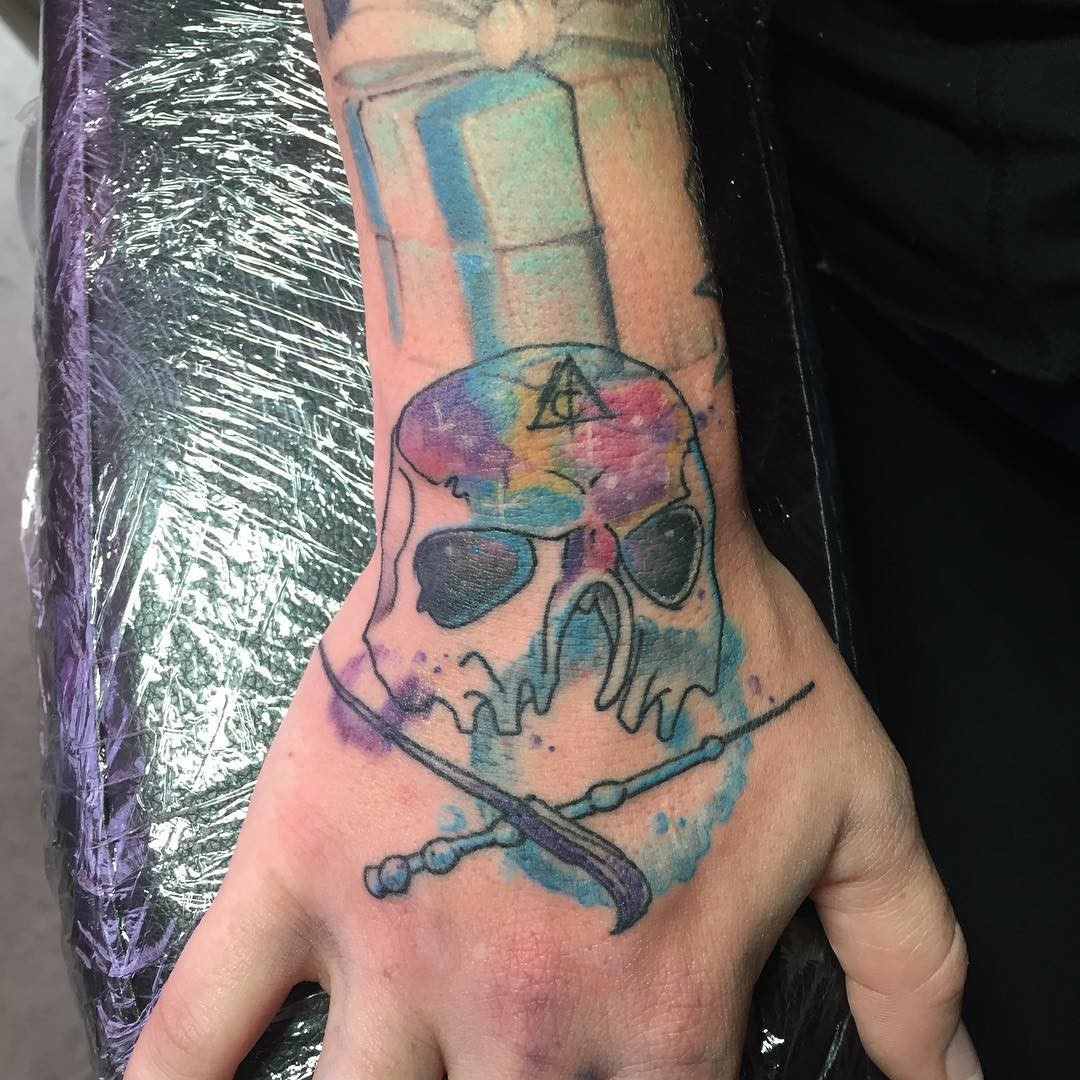Colorful Arm Death Eater Tattoo