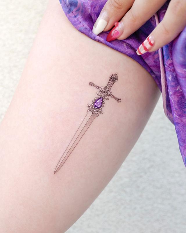 Dagger Tattoo That Show Courage and Bravery 3