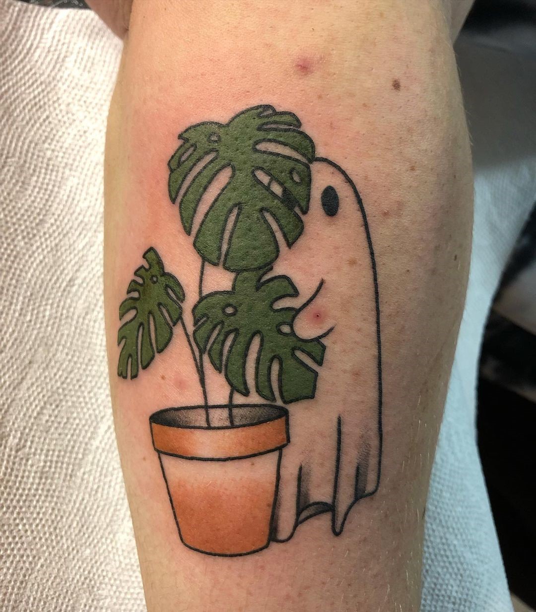 Ghost With A Plant Tattoo 