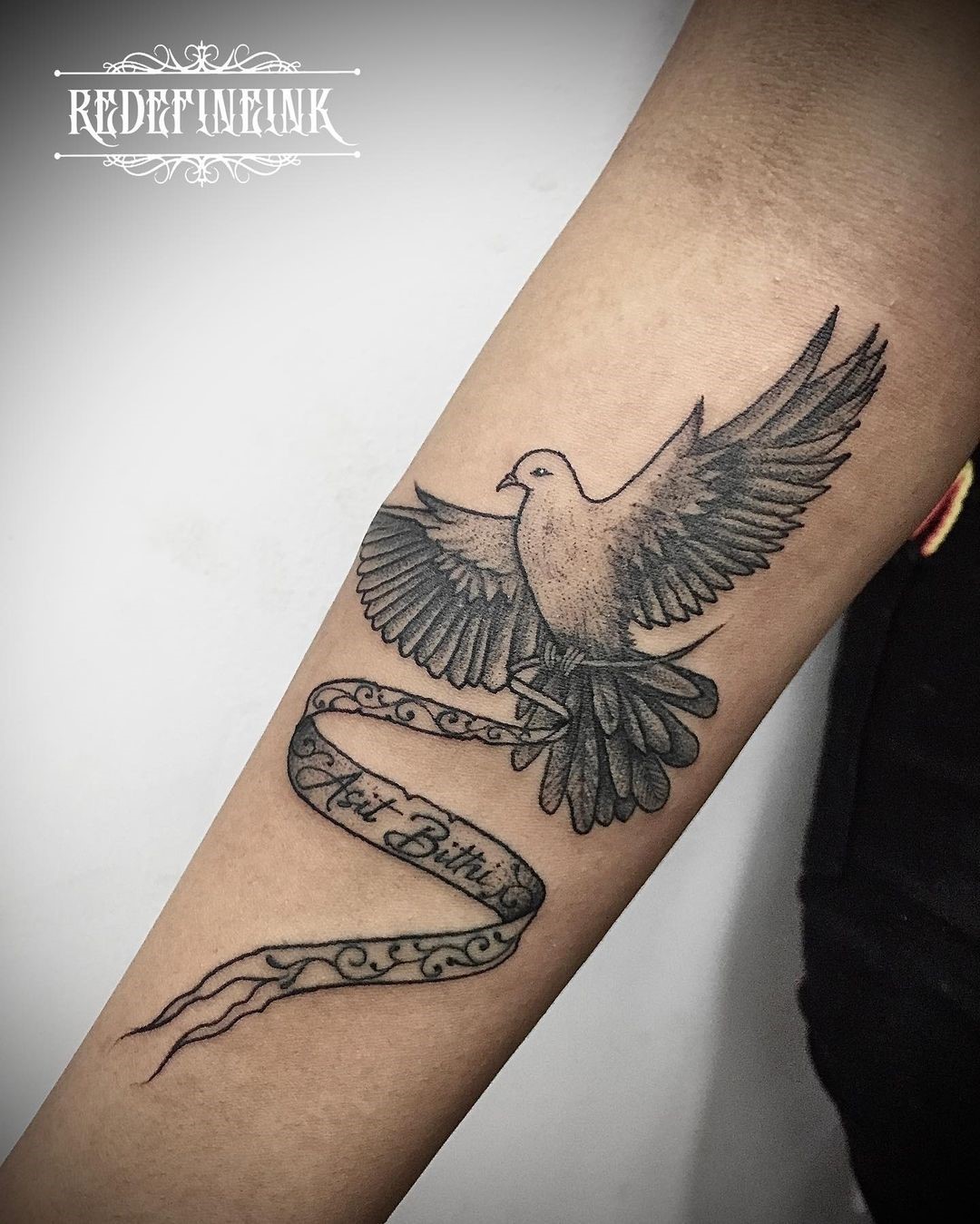 Small & Simple Dove Tattoo