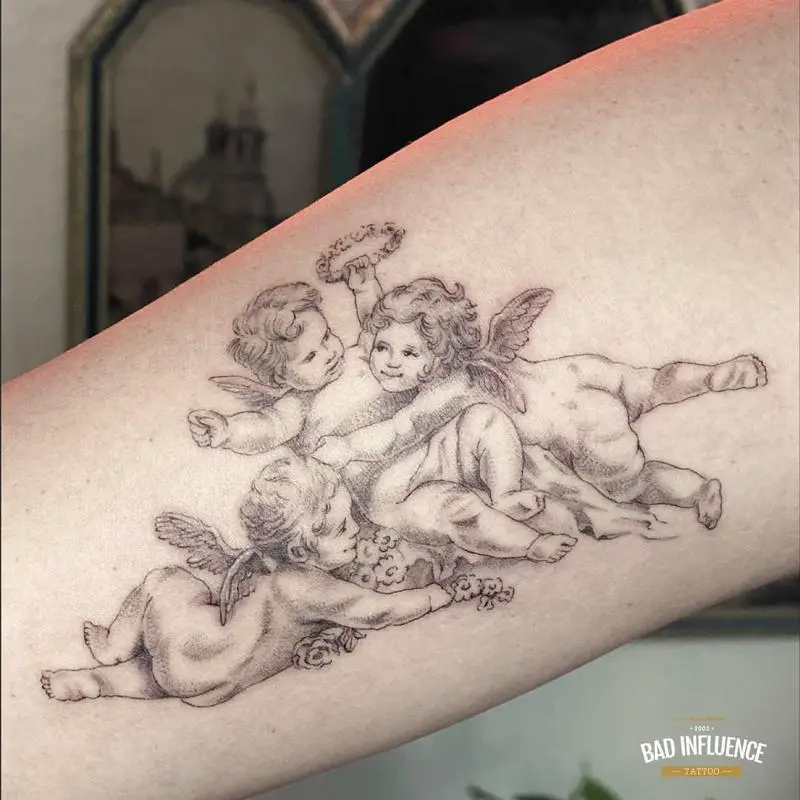 Triple Cherubs Tattoo 1