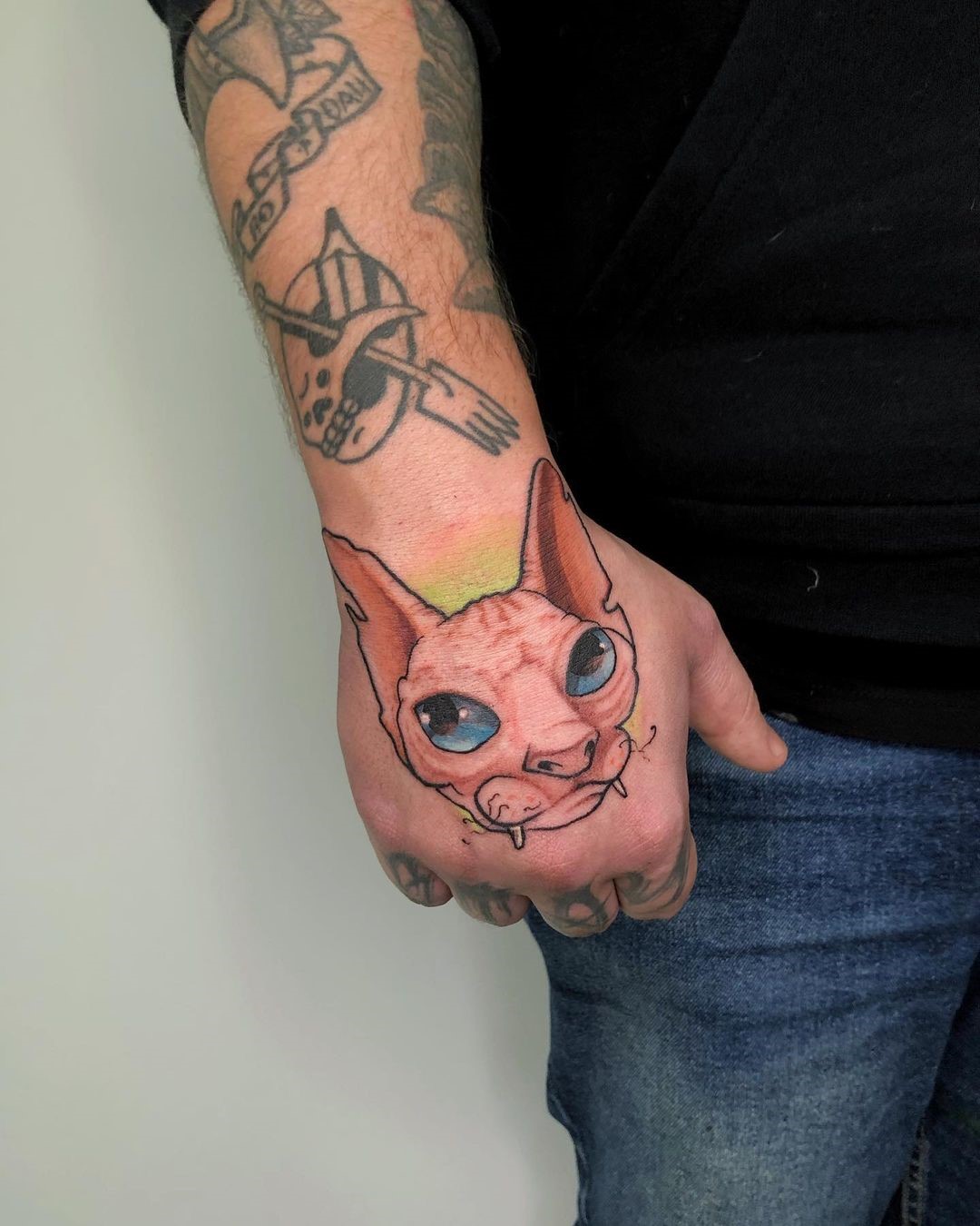 Fist Cat Tattoo Idea