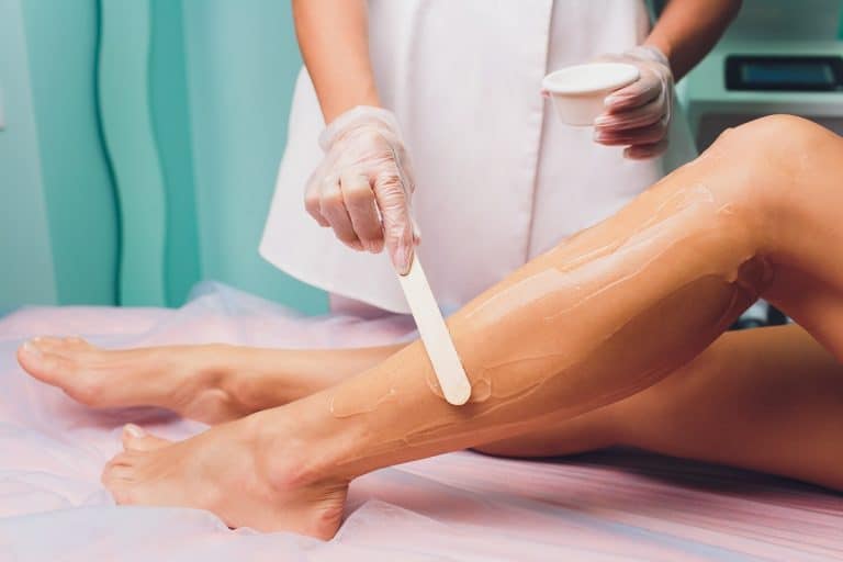 Can I Wax Over a Tattoo: The Dos and Don’ts of Hair Removal Over Tattoos