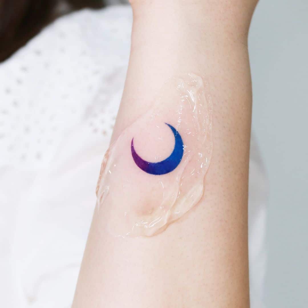 Blue Crescent Moon Tattoo